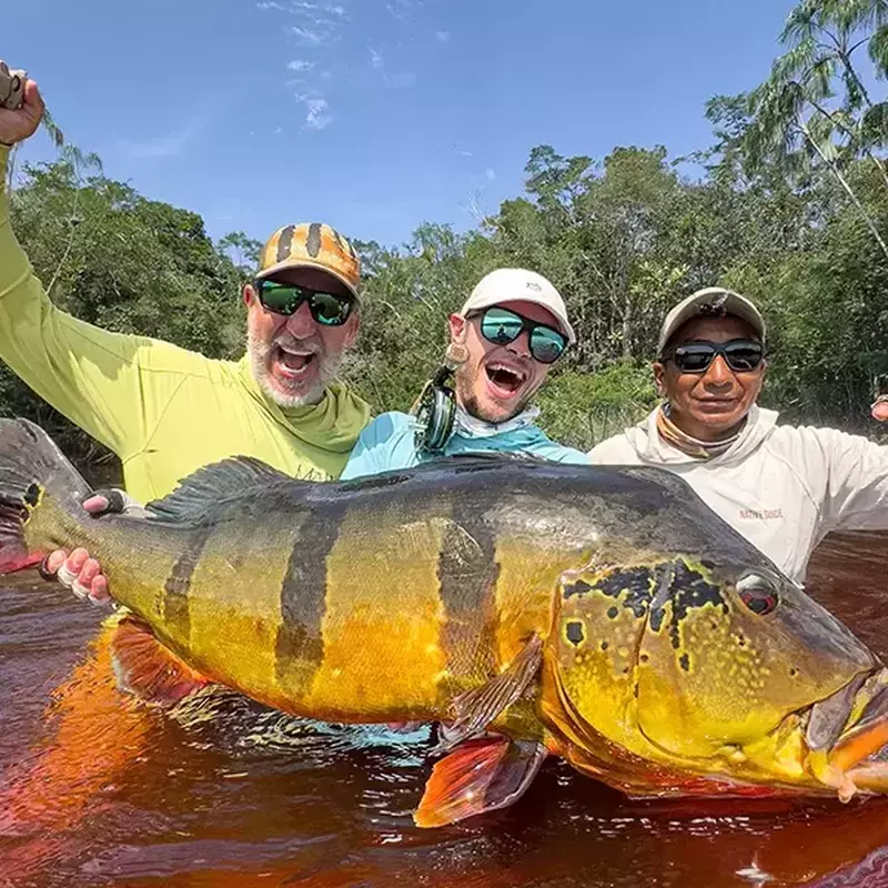 											Alex and crew celebrating brazil peacock bass fishing
																						