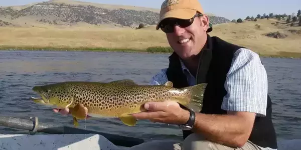 Montana angler with lower madison brown trout