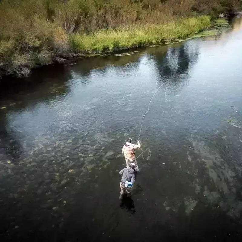 											Anglers fishing the lower Depuy's Spring Creek
																				