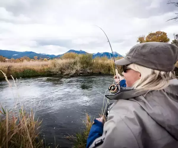 Bozeman angler fishing the best fly fishing in Montana with Fins and Feathers