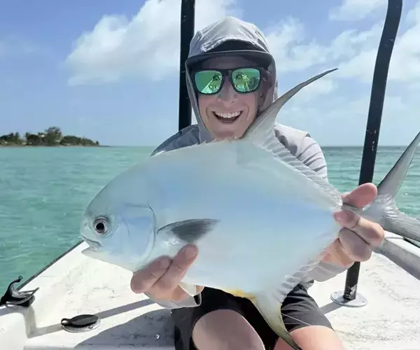 Jackson krause bozeman fly fishing guide with a permit