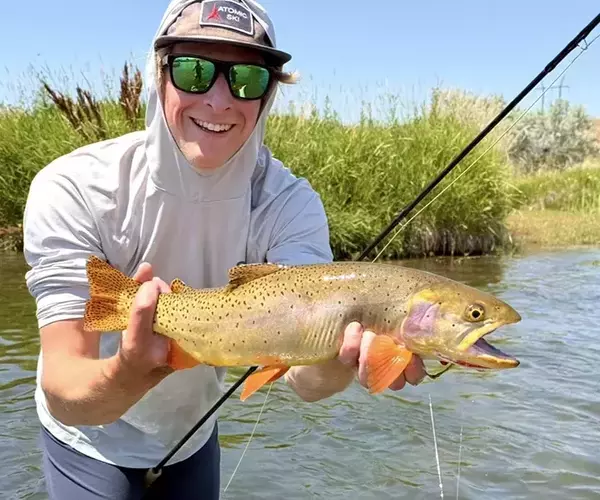 Jackson krause bozeman fly fishing guide with cutthroat trout