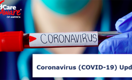 A gloved hand holds a test tube labeled "CORONAVIRUS," against a blurred medical professional. Text below reads "Coronavirus (COVID-19) Update," with a logo for Child Care Aware of America.