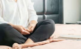 Children's paintings, displayed on a light green wall, are alongside text descriptions. The vibrant artworks include abstract designs and a photo of a child painting. Text describes the creative process.