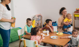 A firefighter wears a helmet while standing next to a fire truck. A Dalmatian looks out from the truck window. Text: "Firefighter Frank, Monica Wellington." Surrounding items: ladder, hydrant, flames.
