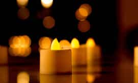 A candle is lit up in celebration of Diwali.