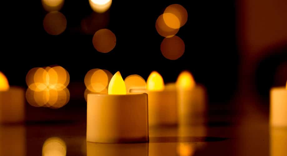 A candle is lit up in celebration of Diwali.