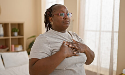 A woman practices mindfulness and meditation.