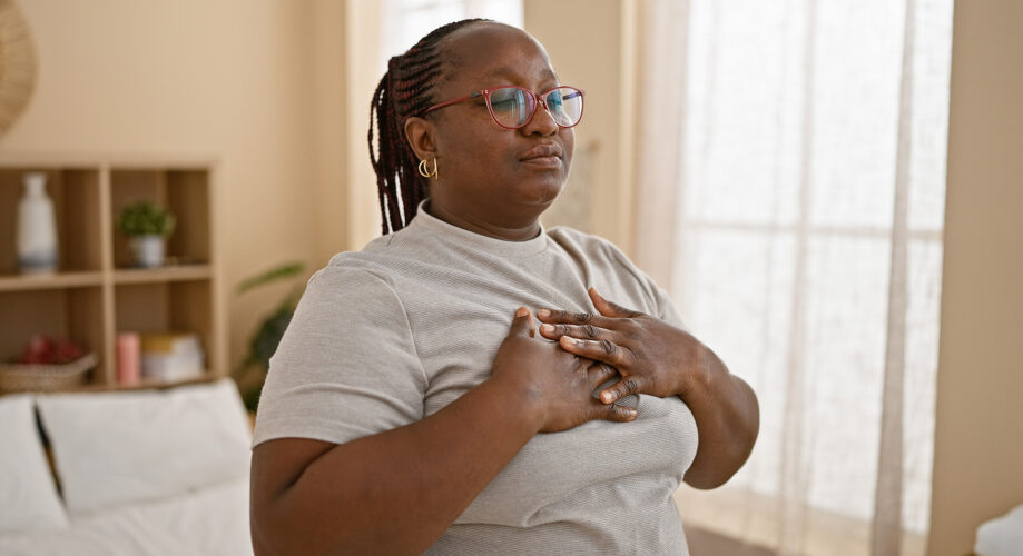 A woman practices mindfulness and meditation.