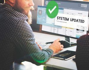 Man using updated process improvement software