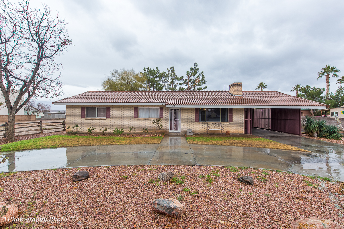3 bed 2 bath ranch style home that sits on a dual residential and commercial lot in the heart of downtown district. RV parking on the side with enough room for a shop or a pool. Walking distance to library, shopping and more. A real wood burning fireplace sits center of a brick wall with wood trim paneling for a nice cozy cabin feel.
Guest bath has a walk in tub and heat lamps in the ceiling and plenty of counter space.
There is a new water heater,water softener and cooktop.
