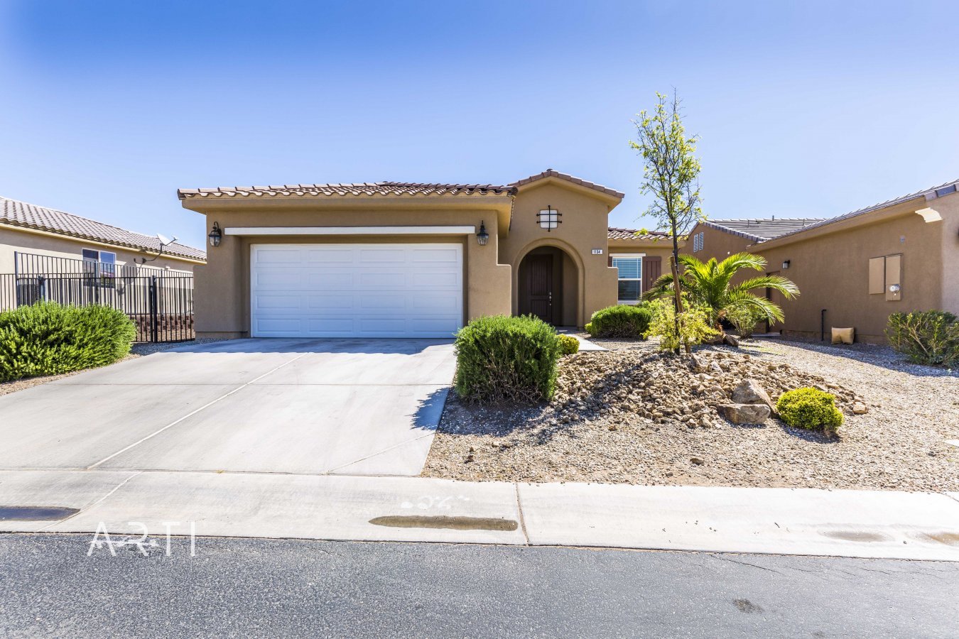 32099 Don't miss out on this beautiful 2 Bedroom Plus Den Home!!! This home features tile flooring that flows right into a new laminate wood flooring. The kitchen and bathrooms are just as amazing with dark cupboards and granite throughout. The outside is just as impressive as the inside with a covered patio, fully landscaped, large side yard and fully fenced. All the appliances are included even the washer and dryer!! Mesquite is a premier location to soak up the sun with numerous activities such as our local recreation center, community events, world class golf, and much more!