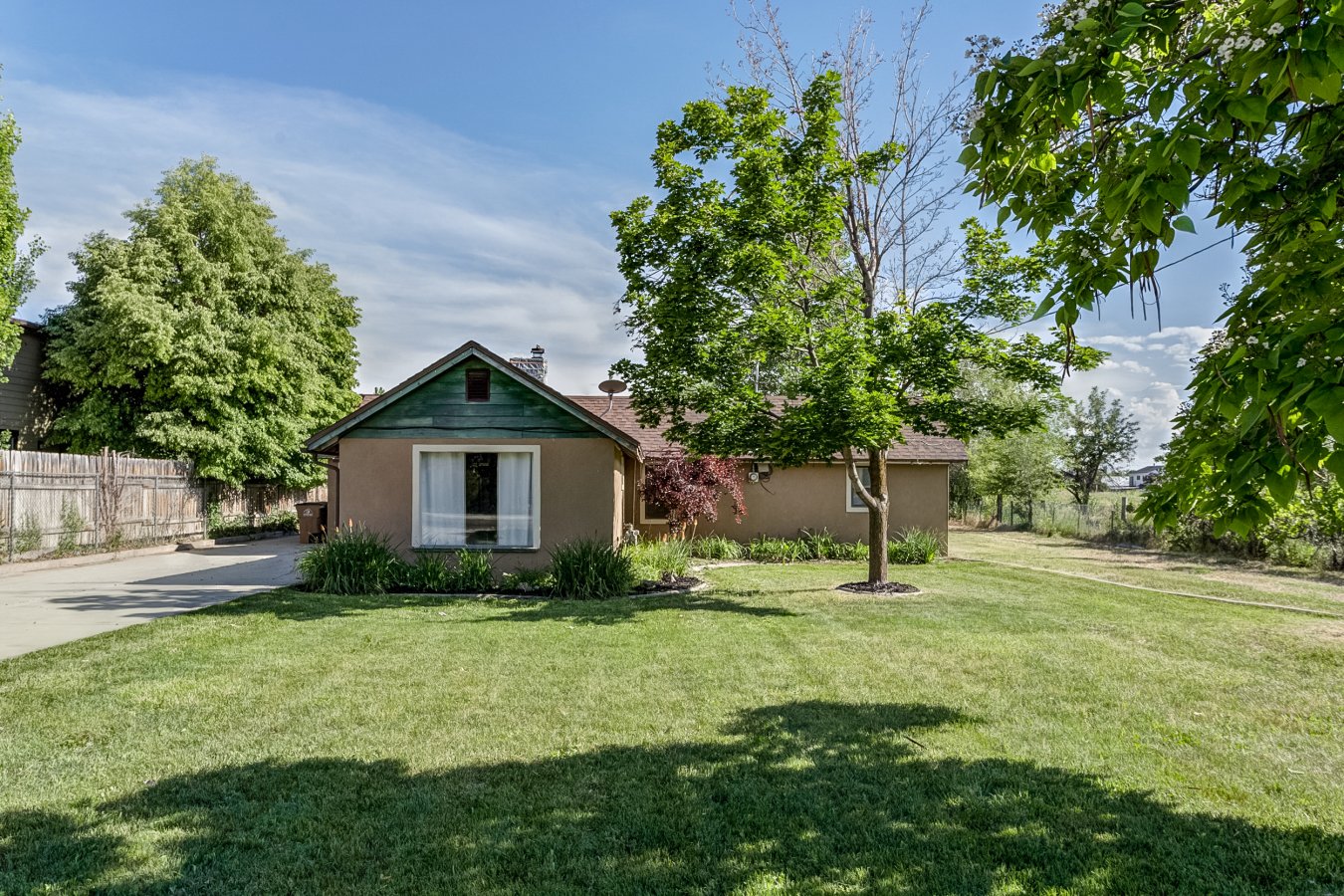 32944 Cozy and comfortable 3 bedroom home on a spacious .34 acre lot in the heart of desirable Draper! Warm, neutral finishes and a great looking rock fireplace with rustic wood mantel provide character and invite gathering. Move-in ready or consider potential as a fixer upper or build new on this great lot! Many exciting possibilities. Great location near outstanding schools, great shopping and restaurants. This property backs up to a brand new high end development with $700-$800,000 homes. Home Sold-As- Is. Square footage figures are provided as a courtesy estimate only and were obtained from Tax Records. Buyer is advised to obtain an independent measurement. Verify All. Fence on the west side of the property is not on the property line and may be taken down as exact boundaries are verified.