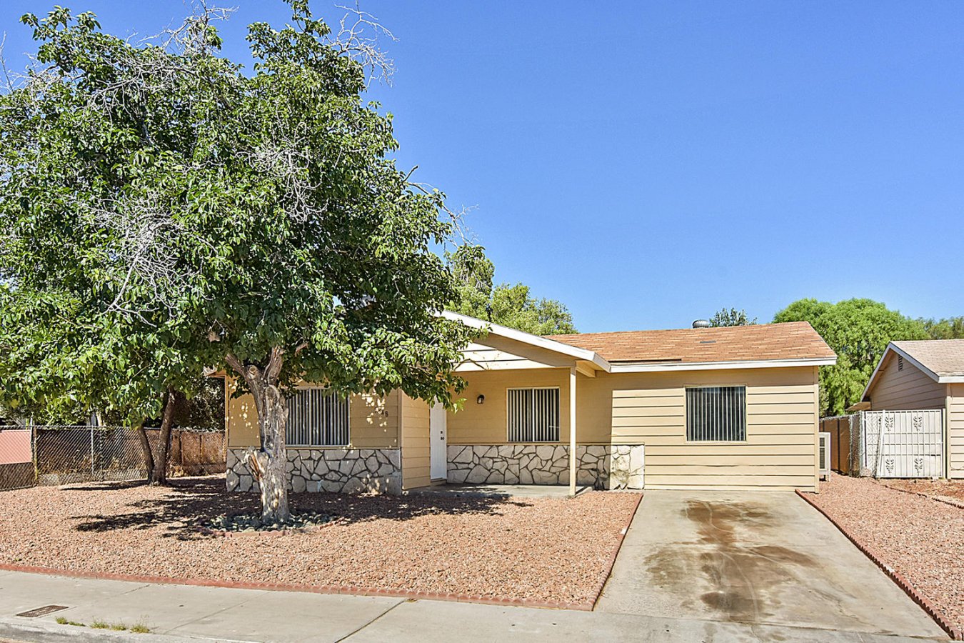 Great 1420 Sq Ft, single story, 5 bedroom, 2 bath home, all appliances, fresh paint in and out, New Kitchen Cabinets, Vanities, Sinks, Faucets, Toilets,and Water Heater, Tile in Tub and Shower, Carpet, Desert landscaping and fenced back yard, Shed