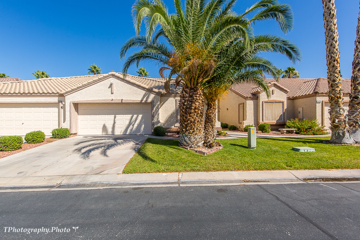 33814 Don't miss out on this beautiful 2 Bedroom plus Den Town home! Located in the desirable community of Sunset Greens with Amazing Golf Course Views!!! Entering this home you will notice the spacious open floor plan that features custom paint and upgraded flooring. The outside is just impressive as the inside with a covered patio, hot tub, water fall and spectacular views!! This Town home is an absolute
