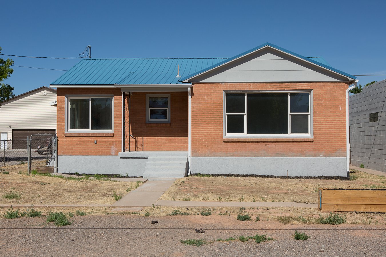 34112 This home comes with a huge garage to put the side by side ATV in that comes with a full price offer on this home. The garage will fit six cars and has a workshop. It is a car lovers dream. It will even be great for someone that needs to store a lot of items and doesn't want to pay for a storage unit. There is a workshop with a bathroom at the back. There are some sheds in the back that would be great for livestock. The large home is full of sunlight and features 5 bedrooms and 2 bathrooms. The home has been redone with new paint, carpet, windows and a refrigerator and stove. Don't let this home get away. For additional property and agent information, click on the virtual tour link below. Seller will offer a $3,500 credit for new furniture or appliances at Ogden's or RC Willey.