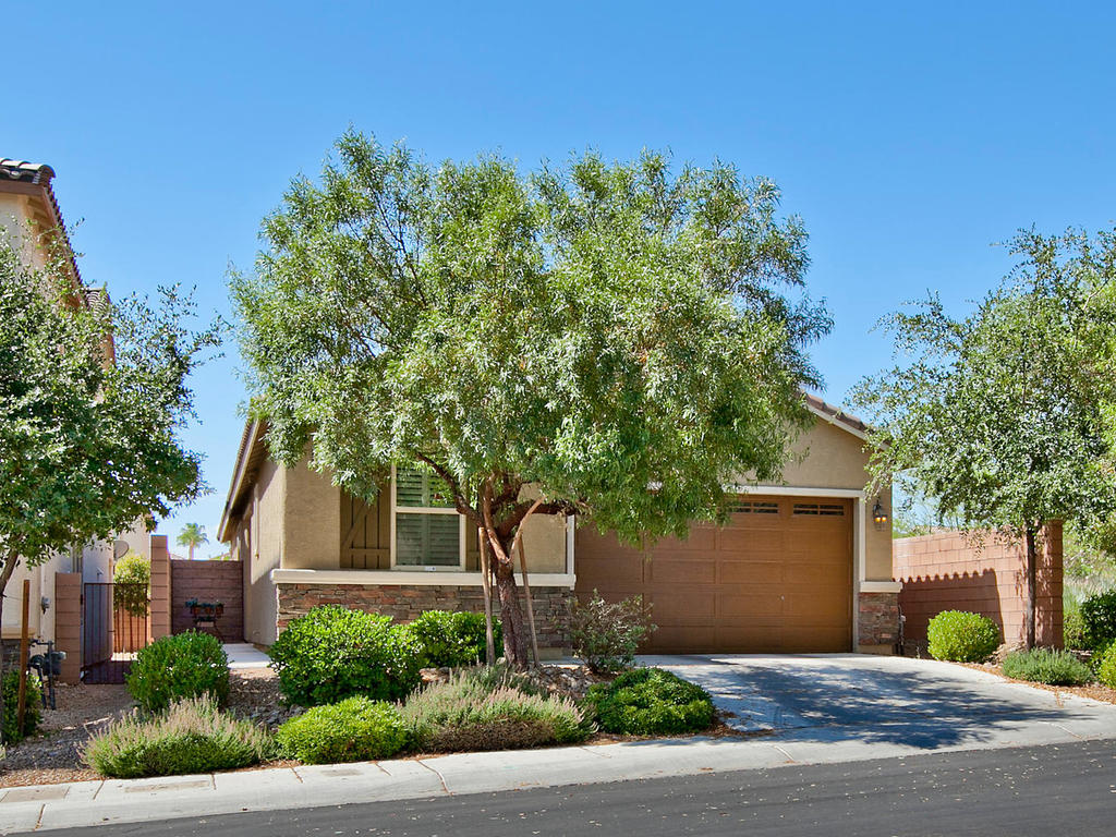 NEAR SUMMERLIN without Summerlin fees * PRIDE OF OWNERSHIP * MASTER BEDROOM and secondary bedroom DOWNSTAIRS * Kitchen features BREAKFAST BAR, BUILT-IN MICROWAVE, GRANITE COUNTER TOPS, DOUBLE OVEN, 5-BURNER COOKTOP, UPGRADED STAINLESS APPLIANCES * GIANT SECONDARY BEDROOM WITH BALCONY overlooking beautiful community park with BENCHES and WATER PLAY AREA * BEAUTIFUL BACK YARD with RAISED PLANTERS and COVERED PATIO WITH CEILING FAN * Near WET N WILD, grocery store, bank, restaurants, etc. Search for all homes available in the Las Vegas area at monkboyer.com. To view the 3D interactive walk-through of this home, click here: https://tours.drbrooksphoto.com/1375010 Call or text Monk anytime to schedule a showing at 702-768-8444.