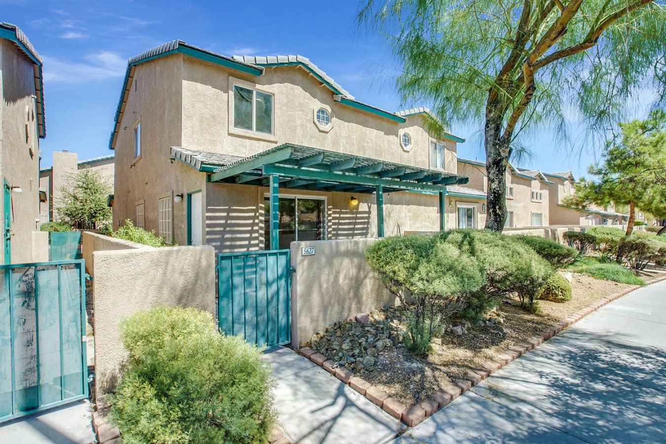 35121 Great location near Tropicana and Jones, this gated neighborhood offers community pool and spa. This townhouse features a large living/dining room with slider to covered patio, all appliances included, and half bath downstairs. Tile floors throughout! Upstairs you'll find 2 bedrooms and a den, and 2 full bathrooms. Both large bedrooms have walk-in closets! 2 car garage. Priced below comps! Don't miss out!