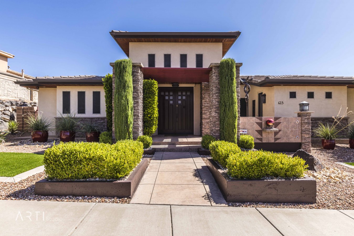 35423 This former parade home located on Foremaster Ridge will awe you. The beauty of its craftsmanship blossoms around every corner. Unsurpassed quality & timeless design sets this home apart far from the rest. With private courtyards, custom detailed woodwork & fine cabinetry throughout. Double sided fireplace, outdoor kitchen and custom pool featuring a 60 ft lap lane. Click 3D tour to be captivated.
A study that features crafted stained art glass library doors and custom wood encased box lighting. The unique hanging wood soffit in the great room is accented by inlaid wood, fitted with surround sound and recessed lighting, a true masterpiece. Far too many remarkable qualities to be fittingly described here, this really is a home you must see for yourself.