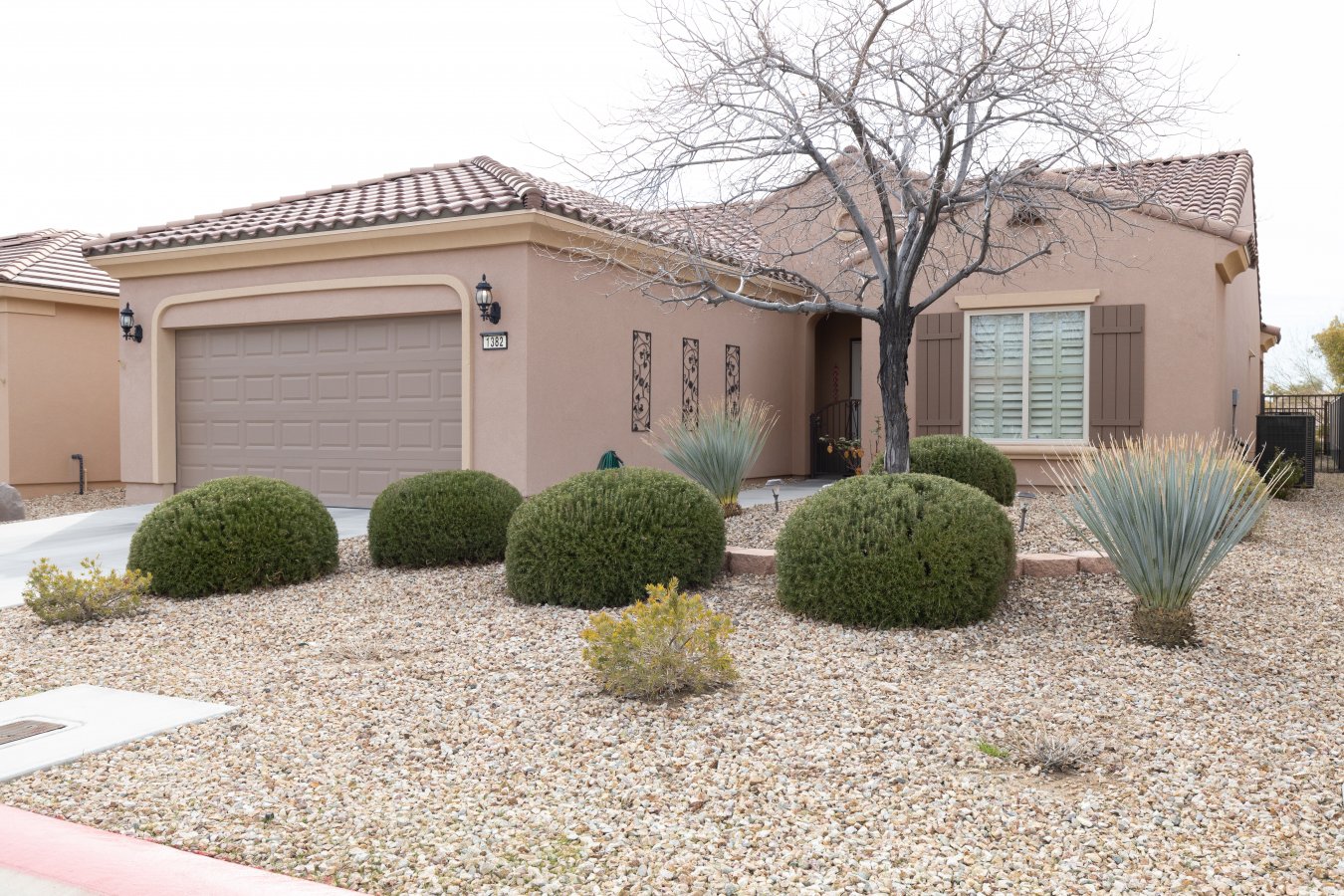 38521 Don't miss this home located in 55+ community of Wagon Trail Run in Sun City Mesquite. Great room, Dining, and Kitchen open concept great for entertaining! Two bedrooms +Den/office. An extended covered patio where you can enjoy Mountain and Mesa Views from your back yard. Plantation Shutters through out,ceiling fans in all rooms, Kitchen with plenty of counter space, pantry, Stainless range, Microwave,and dishwasher and RO system. Wired for surround sound, Alarm system,Smart Box,built-in cabinets in garage. This resort lifestyle living offers a recreation area with indoor and outdoor swimming, golfing, tennis courts, pool table, pickle ball and so much more.