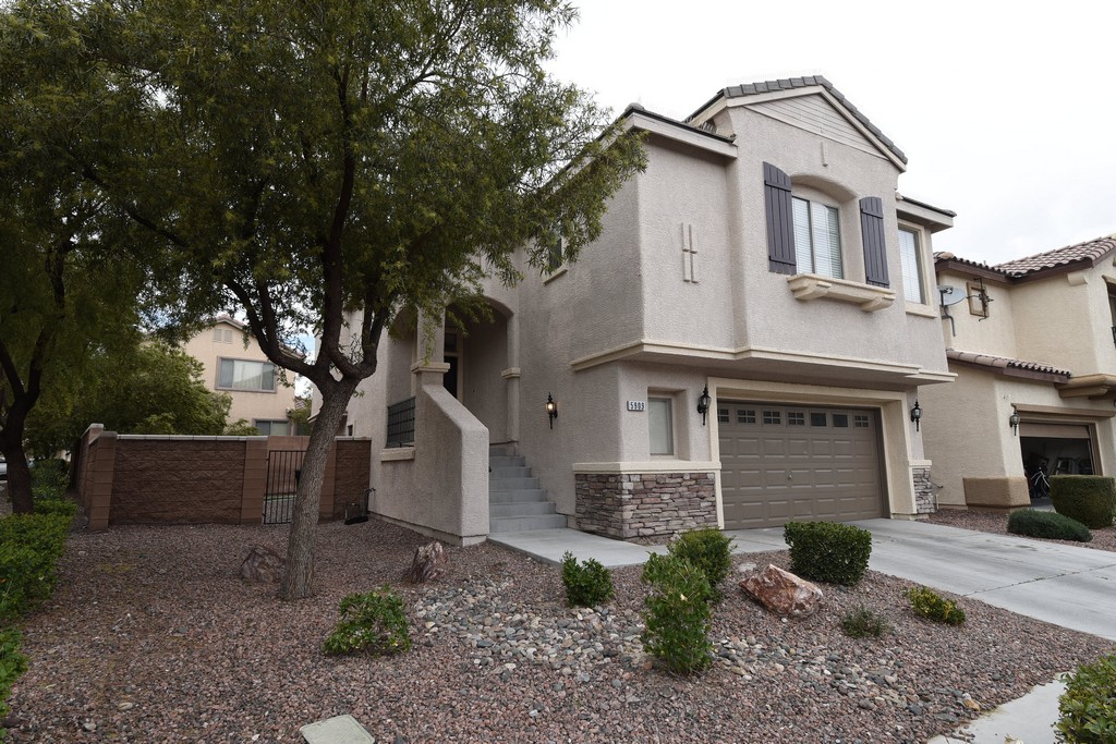 39063 Fabulous 4 BR 3 BA, 2 Story in North Las Vegas. Unique open floor plan. Family room has fireplace, Balcony overlooking back yard. Kitchen has Corian counter tops, New Stainless steel appliances, including new refrigerator and loads of cabinets. Interior just painted. Flooring is Laminate wood and tile. Desert landscaping. Nearby parks. Very nice home.