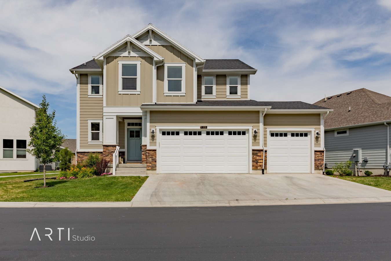 40714 Conveniently located just off of the freeway near Farmington Station in a quiet, picturesque neighborhood you will find this gorgeous, like-new Craftsman style home that is sure to impress! The attention to detail will be hard to miss as soon as you enter from the welcoming front porch with a mountain view! The living room, complete with large windows and a gas log fireplace, is open to the bright kitchen that features warm-toned hardwood floors, quartz countertops, and stainless steel appliances. The wall of windows in the dining nook overlook the beautifully maintained lawn and common area. There are three large bedrooms and a full bathroom upstairs in addition to the master suite with a garden tub, separate shower and walk-in closet. The basement has been finished with a large gathering area ready for your projector and screen, a game table or to be used as a cozy project area. You'll also love the large storage closets, barn door, full bathroom and dry bar area in the basement, not to mention the three car garage. Welcome home!
