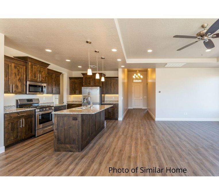 41259 This beautiful modern home in Zion Vista wont last long. To be completed late May! With Views out the back and large open floor plan, granite kitchen counter tops, 8' doors in the main living space, gas range, and extra wide garage, large windows and more. 3D TOUR OF SIMILQAR HOME-https://my.matterport.com/show/?m=8UaDWPtauj&brand=0