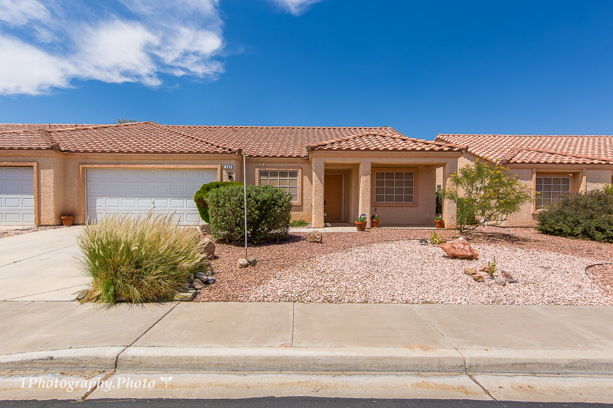 41418 Don't miss out on this beautiful townhome! Featuring 2 Bedrooms Plus a Den, 2 Bathrooms, and a 2 car garage. Entering this home you will notice the spacious open floor plan. Freshly painted and all appliances included. Even the washer/dryer! A Simplisafe Home Security System is installed. The outside is just as impressive as the inside with a covered patio, fully landscaped, and enclosed backyard. Low maintenance landscaping and a small HOA fee of $44 a month makes this home a