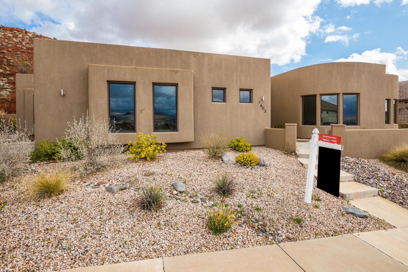 41481 Clean, modern, Jeff Andrews Design, this truly one of a kind home has amazing features. Overlooking the west desert this hilltop home has beautiful engineered hardwood floors, an upgraded kitchen, quartz counters all on a large .4 acre lot. Heated and cooled 3 car gauge. This home is perfect for those looking for something unique, and elegant!