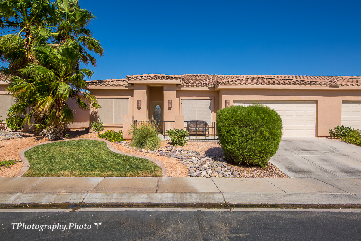 41790 Don't miss out on this beautiful open floor plan featuring 1419 sq ft, 3 Bedrooms, 2 Bath and a 2 Car Garage. Located in a small, quiet community, with minimal HOAS. The kitchen is bright and open with solid surface counter tops, tile flooring, a large breakfast bar and additional built in cabinetry. Master Bedroom is quite large and has a walk-in closet. Guest bedrooms are at the front of the townhome which provides additional privacy for your guests. Living room and bedroom flooring has been upgraded to laminate wood. The outside is just as impressive as the inside with a covered patio, fully landscaped, and enclosed backyard. Low maintenance landscaping and a small HOA fee of $95 a month makes this home a