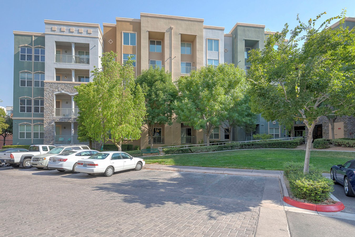 Located in guard gated Manhattan Condos, this beautiful move-in ready 2 bedroom condo is just minutes from the Las Vegas Strip & brand new Raiders Stadium!! Spacious living room is open to the kitchen and dining area and has a sliding glass door that leads to your own huge private balcony. The kitchen features granite counters, walk-in pantry, breakfast bar & pendant lights. Large master bedroom is separate and offers plenty of space and a walk-in closet. Master bath includes double sinks, separate tub & walk-in shower. Second bedroom is spacious as well! Ceiling fans throughout. Enjoy all of the incredible amenities in this luxury resort-style community - 24/7 security, underground assigned parking, 2 swimming pools/spas, BBQ area, fitness center, clubhouse & dog park!! Come see all that this spectacular property has to offer!!