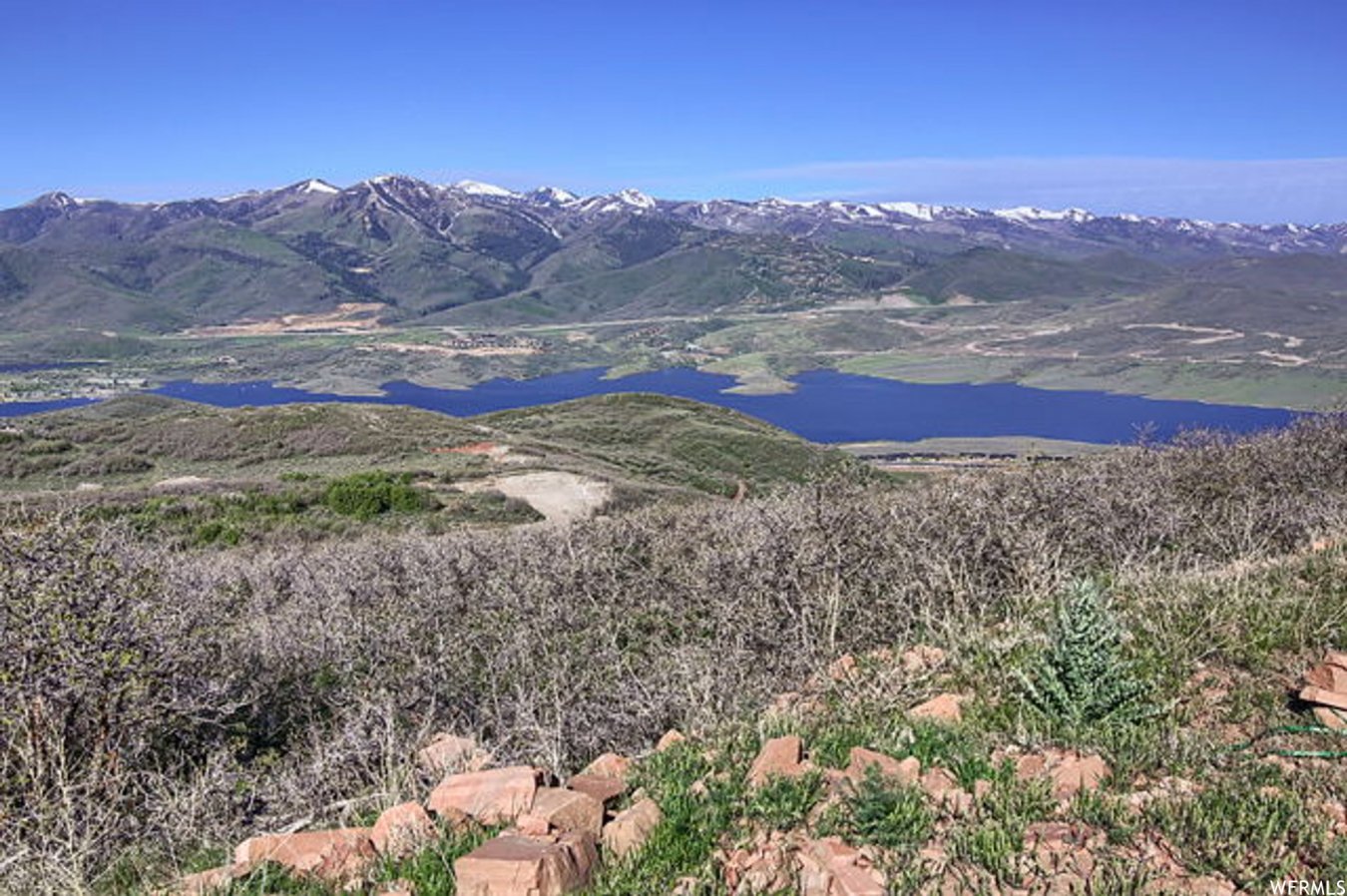42743 Introducing the new Golden Eagle community, offering Luxury Living in one of natures most breathtaking locations. Different from the communities in the area, Golden Eagle homesites provide the most stunning combination of mountain, lake, and ski resort views. Enjoy the incredible panoramic vista of the Jordanelle and surrounding mountain from this Golden Eagle Lot #16. This mountain development will have a community gathering space with kitchen, bathrooms, indoor and outdoor spaces plus a fire pit to relax around and share the days events with family and friends. There will be five-miles of trails connecting Golden Eagle to Soaring Hawk. Come this Winter to experience the greatest snow on Earth in our 6,900-foot elevation mountain town.