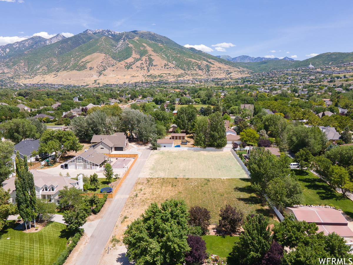 42823 Price adjustment! The development work has been done for this lot and the lot adjacent. This lovely property has a view of the mountains and is off a private lane in a sought after neighborhood. Don't miss this opportunity to build your dream home in Draper. All information is deemed reliable. Buyer to verify all information. Taxes on this lot will be assessed for 2021. An access lane agreement and cc&r's will be filed with the county.