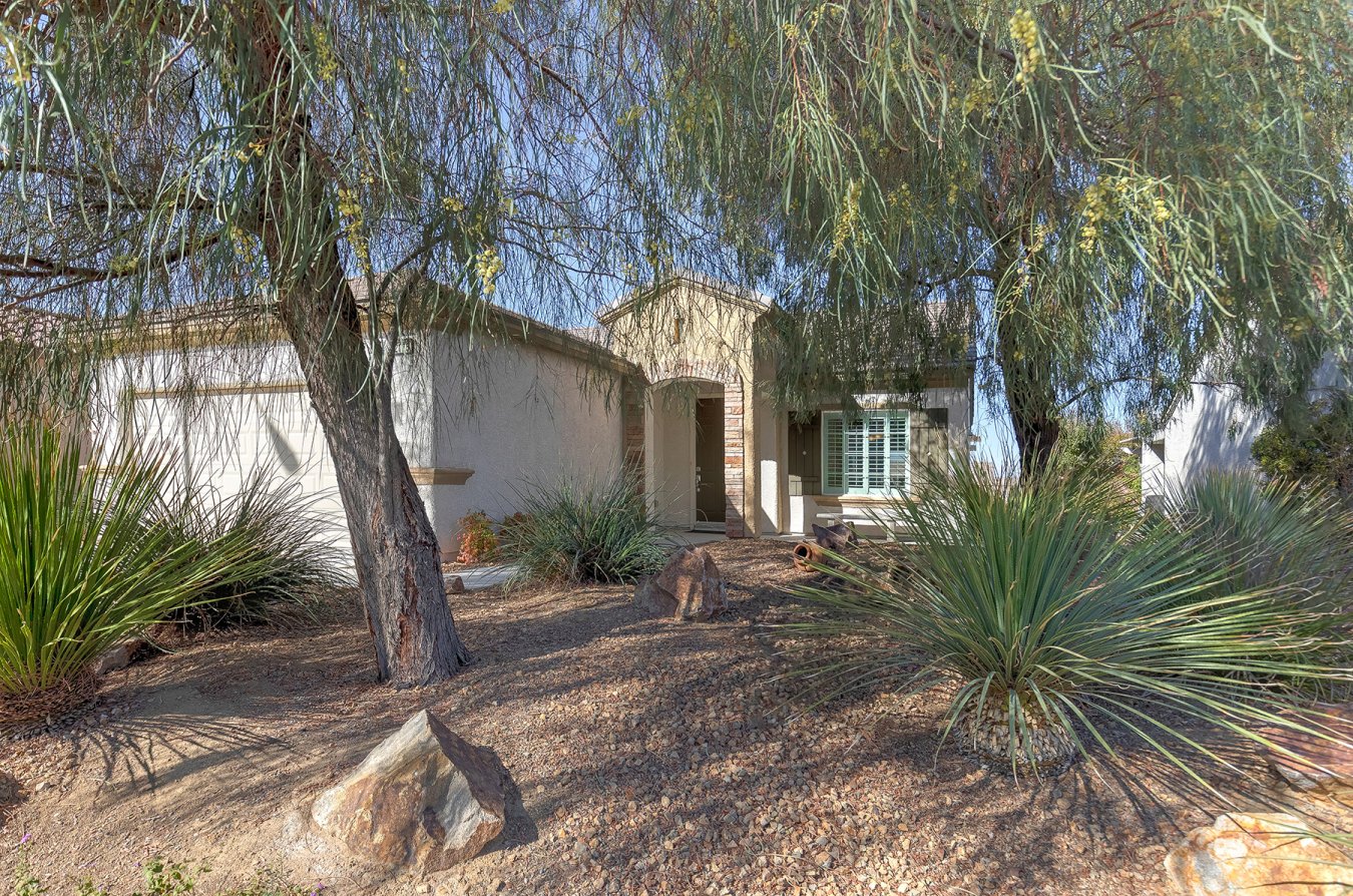Great Delaware Model (1496 Sq Ft) 2 Bedroom, 2 Bath, All Appliances, All Tile, except carpet in bedrooms, Shutters, Extended Covered Patio, Elevated Lot, Easy Care Desert landscaping, Finished 2 Car garage with Storage Cabinets and Epoxy Floor, New Water Heater, Home is in great condition, Come and have a look