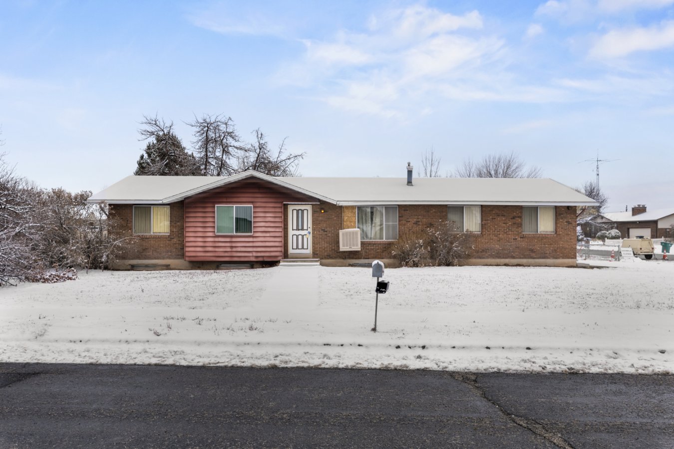 44738 This nostalgic 3 bedroom 2 bath Rambler could be the perfect gift for someone this holiday season! Just imagine in the summer picking apples right off your very own apple tree in the large fenced backyard. In the winter months cozy up to the warmth of the wood burning stove in your living room or work on your projects in your heated 2 car garage. The large basement is unfinished and awaits your creativity to make it your own. Close, 10 minute drive to Hill AF base. Being sold as is. This charmer of a home won't be on the market long.