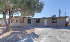 5 bedrooms for this price? Yes, it's true and in fact there are 2 extra rooms which could be bedrooms as well! This house has all new paint inside and out with tile floors throughout (except the bedrooms), so it is move in ready. The kitchen features granite countertops, built in microwave, and refrigerator. The bathrooms have been remodeled with tile showers and new fixtures. There is a large, almost fully enclosed patio making this house much larger than you would think. The backyard is fenced in with plenty of room for family gatherings. Hurry, at this price, it won't last long!