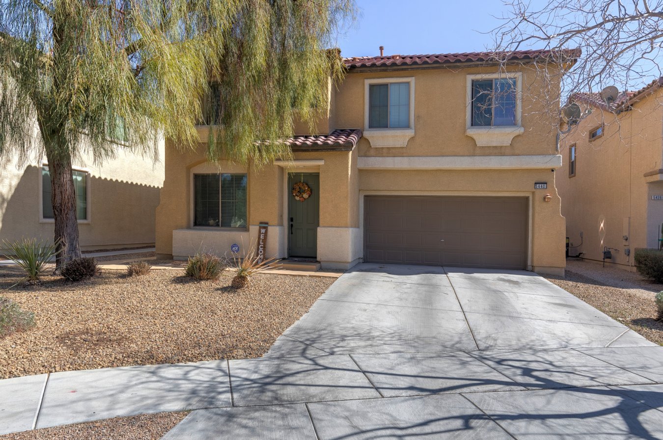 46716 Gorgeous home with blinds and ceilings fans throughout. Laminate flooring in traffic area and two year old carpet throughout. Kitchen has refinished cabinets in latte color with black knobs, under mount oversized sink, granite, stainless steel appliances, breakfast bar and pantry. Gas fireplace in large den. Newly landscaped backyard oasis with pavers, turf, covered patio, ceiling fan, BBQ stub, and outdoor kitchen space. Two year old water heater. Huge loft. Primary bedroom with balcony and custom closet. Primary bathroom has dual sinks and separate bathtub and shower.