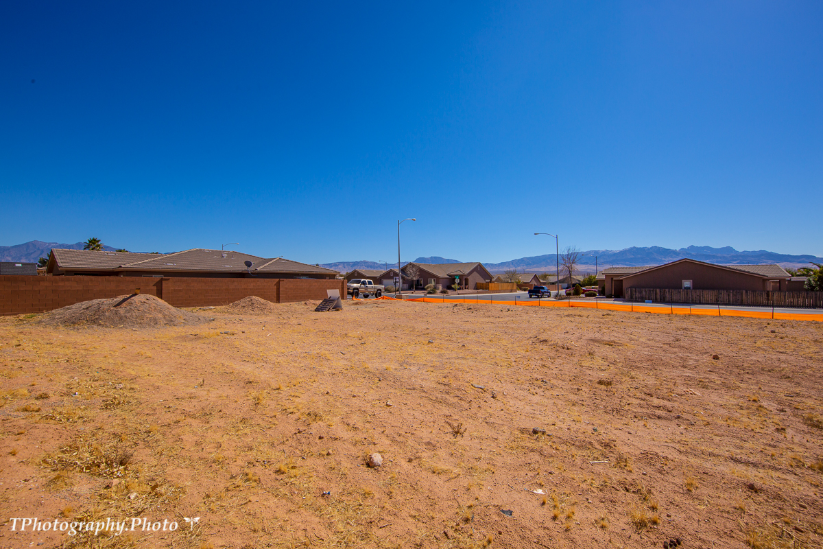 Excellent .16 acre lot located in the established community of Santa Theresa Estates. Build your dream home with any builder. Plans subject to CC&R guidelines. Partially fenced with mountain views. Utilities are available to the property line.