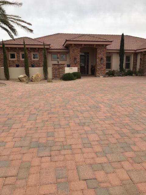 47044 If you are looking for an oasis in the desert, look no more. This stunning home boasts 4 bedrooms 4 baths, 4 plus car garage and a backyard paradise with solar heated pool, hot tub and outdoor kitchen entertaining area for all your needs. Inside you will find one of a kind tile work, beautiful kitchen, gorgeous lighting and a wall of windows to enjoy the beautiful views outside.