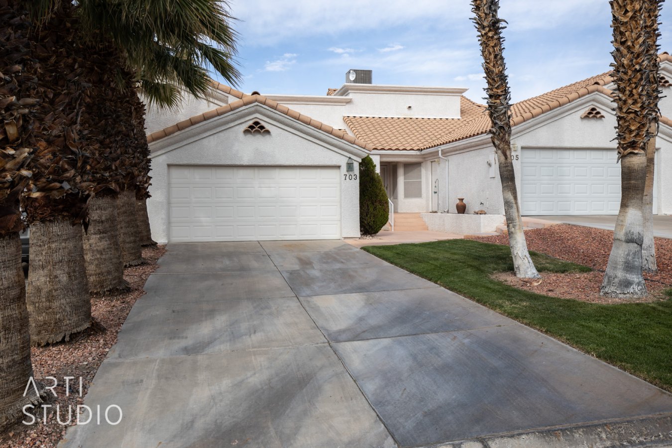 47347 Escape to your own little oasis in the heart of Mesquite! This charming townhome offers an open floorplan with vaulted ceilings which gives it a spacious feeling and is great for entertaining. The large master bedroom includes a master bath with a big tub, shower, and walk-in closet. There is an atrium with a large fountain that separates the Master Bedroom and Guest Bedroom, and if you open the windows at night you get the soothing sound of trickling water. Relax on the back patio enjoying the views of Mesquite while listening to the waterfall run into the pond and when the day starts to warm up you are just steps away from accessing one out of the two pools located in the subdivision. The attached two-car garage is just one more perk this home has to offer. It's conveniently located in the heart of Mesquite near the casinos and shopping or hitting the trails in the open desert. This home offers everything you need to make it a vacation get-away or a permanent residence.