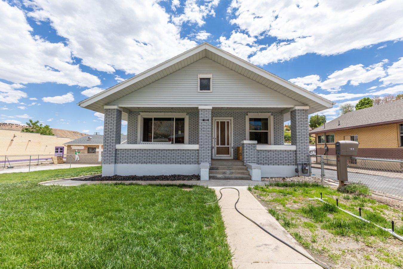 As the saying goes LOCATION, LOCATION, LOCATION! This unique property sits right in the heart of famous Historic Helper City with one of the best views of Balanced Rock around. If you have been thinking about starting a home business don't miss out on this rare opportunity to do just that! This home comes with a plethora of possibilities. There is ample parking for customers or guests. Using only a smidgeon of inspiration and a dash of motivation you could finish the basement to manifest your own vision of a cozy apartment with separate entrance for long term renters, family and guests, or perhaps a short term rental space. But we know not everyone wants to share their home with others, or use it for passive income! The city of Helper is also home to many artisans, creators, and entrepreneurs. Imagine transforming your new basement into an art studio or small craft shop. Grow a little privacy and charm on your front porch by surrounding it with potted plants, bird feeders, wind chimes and hanging greenery. There will be plenty of time to relax on your shady porch where you might just choose to chill on the swing while reading a good book or settle in to watch the show as the setting sun washes our Balanced Rock cliff face in golden light. At the end of a long day you might decide to visit the 'coming soon' brewery and pizzeria next door and catch up with an old friend over a cold beverage. But most nights, you may prefer sticking around your at-home hang out where you personalize a back garden area to sit around an outdoor fire, relax beneath the shade of a gazebo, or gaze in wonder at a canopy of stars best seen in dark skies communities like Helper. In addition to art, nature, opportunity and adventure; whoever purchases this property can expect to enjoy great utility features as well! Owner will pay off solar panels and new windows in full at closing. This home boasts a new roof, new water heater, new paint, updated lighting and plenty of storage space! There is a detached workshop just waiting for a new business owner. Fiber internet is just as fast here as in a crowded city. Work and play where you live! Square footage figures are provided as a courtesy estimate only and were obtained from County records. Buyer is advised to obtain an independent measurement.
