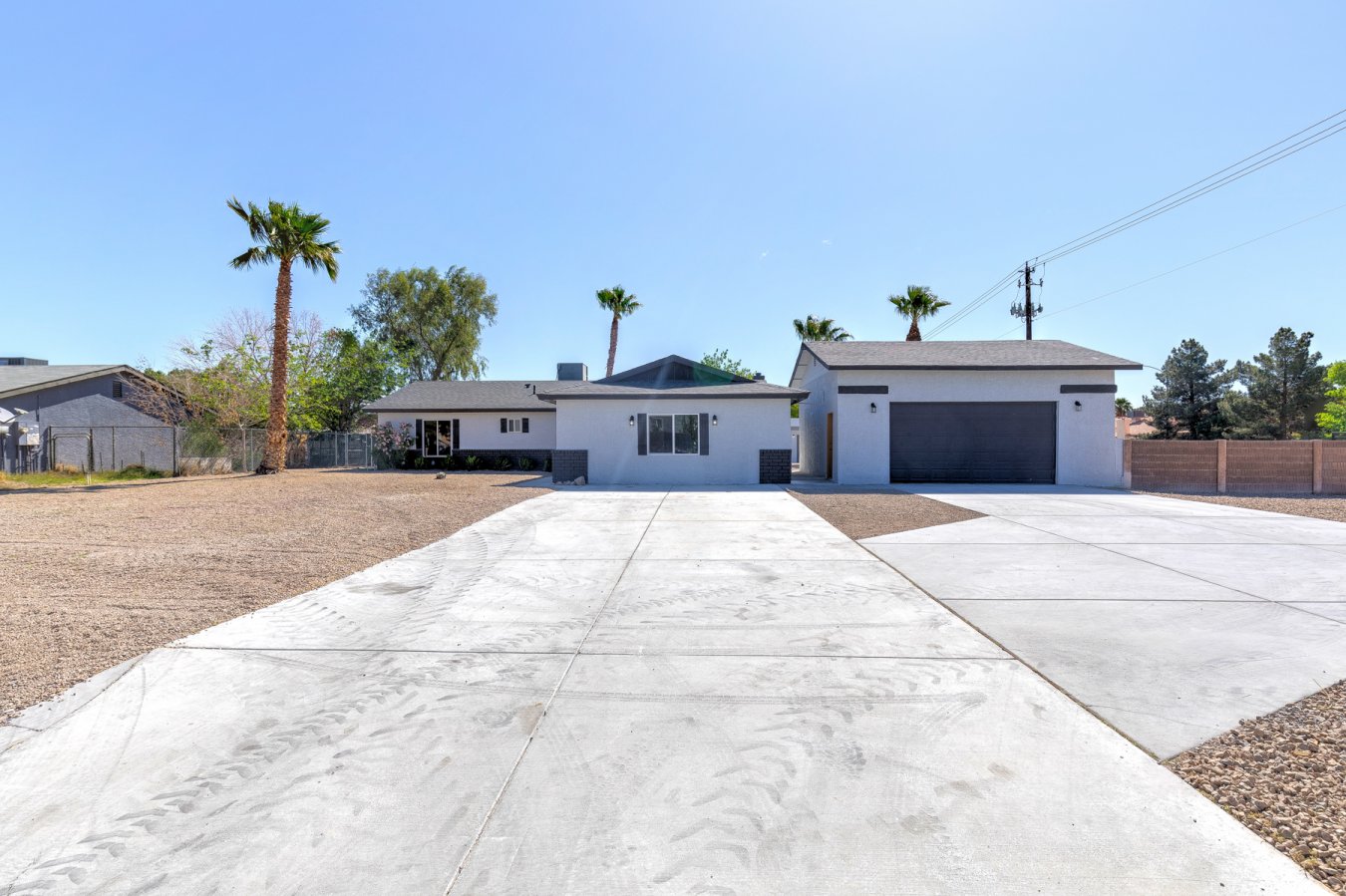 48544 Priced well and ready to sell. Check out this 1/2 acre compound nestled in the heart of North Las Vegas! This property has been completely renovated from top to bottom, Everything is new from brand new carpet, paint, kitchen cabinets, granite countertops, stainless steel appliances, tile floors, and so much more. While you tour take a look at the one bedroom and bath w/ living room and kitchenette guest house cornered in the rear right side of the property with a side gate entry. Don't miss out on this huge property Act fast it wont stay long on the market. Contact list agent today for a personal tour!