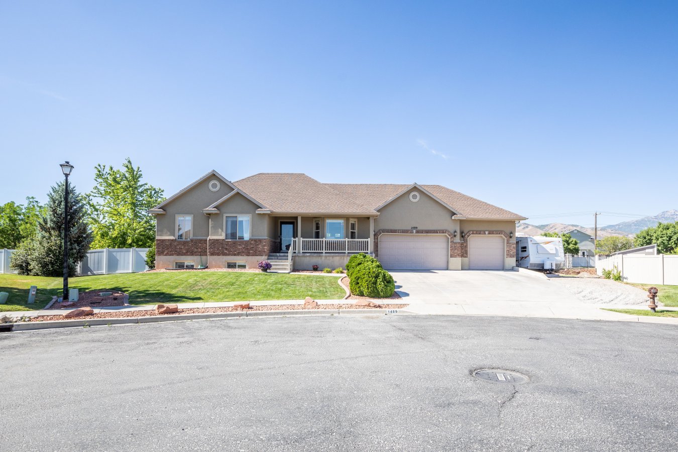 49690 Fantastic, one-owner 5 bed / 3 bath Rambler! Enjoy cul-de-sac living in this wonderful NW Lehi neighborhood. Stunning tiled in shower and tub in newly updated Master bath. The kitchen boasts an oversized marble Island, darling subway tile backsplash, new laminate flooring, and fresh paint. Spacious, fully finished daylight basement, light and bright, plenty of storage space, complete with a salon. Large 3 car garage with workbench, RV parking, and HUGE .39 acre lot, concrete pad already in place and plumbed for a hot tub. Great location!! close to dining, schools, shopping, fwy access, Thanksgiving point and more. Square footage figures are provided as a courtesy estimate only and were obtained from building plans. Buyer is advised to obtain an independent measurement.