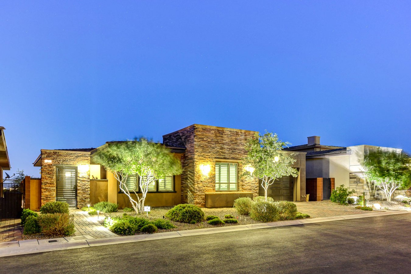 **NO EXPENSE HAS BEEN SPARED IN THIS GEM THAT SHOWS LIKE A MODEL!! STRIP & MOUNTAIN VIEWS!! OVER $200K IN BUILDER UPGRADES PLUS ANOTHER $175K IN ADDITIONAL UPGRADES!** Located in Regency at Summerlin - a resort-like guard gated, active adult 55+ community by Toll Brothers. Gated, serene courtyard leads to the front door of your dream home that is loaded w/premium details throughout. 12' multi-slide glass doors bring together the luxurious indoor/outdoor living spaces! Gourmet chef's kitchen features quartz counters, custom cabinets, pot filler, walk-in pantry w/custom built-ins PLUS a separate office/desk area. Spacious great room offers 60