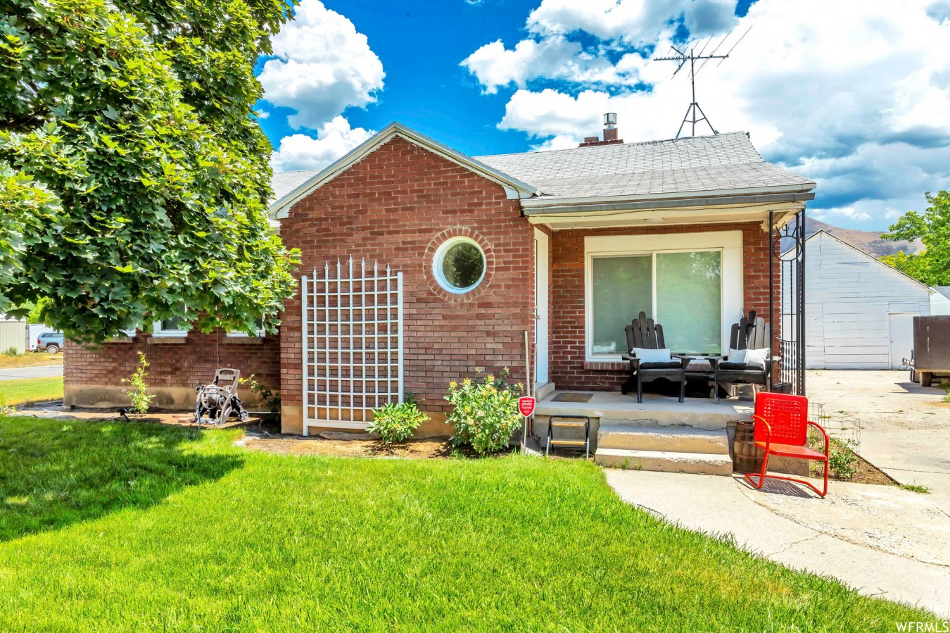 50244 Newly remodeled brick rambler! This home has a basement mother in law apartment with a second kitchen, with its own
separate entrance. Up and down has their own washer and dryer. New paint, new floors, updated fire place and HVAC. House is on a large lot with a huge backyard. Room for parking your trailer, RV, or toys. Detached garage provides for a nice shop or extra storage.