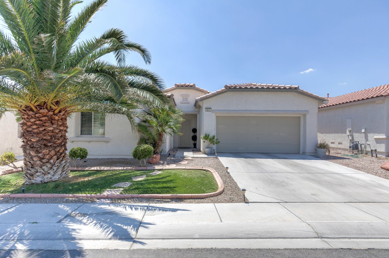 50777 This amazing single story home features 4 bedrooms, 2 full bathrooms both having double sinks, 2 car garage, open floor plan, master bedroom separate from other bedrooms, spacious kitchen with plenty of counter top space, breakfast bar over looking huge living room, pantry, ceiling fans throughout all rooms, two tone paint and much more. Relaxing sparkling pool and spa has a waterfall feature, private backyard and covered patio.