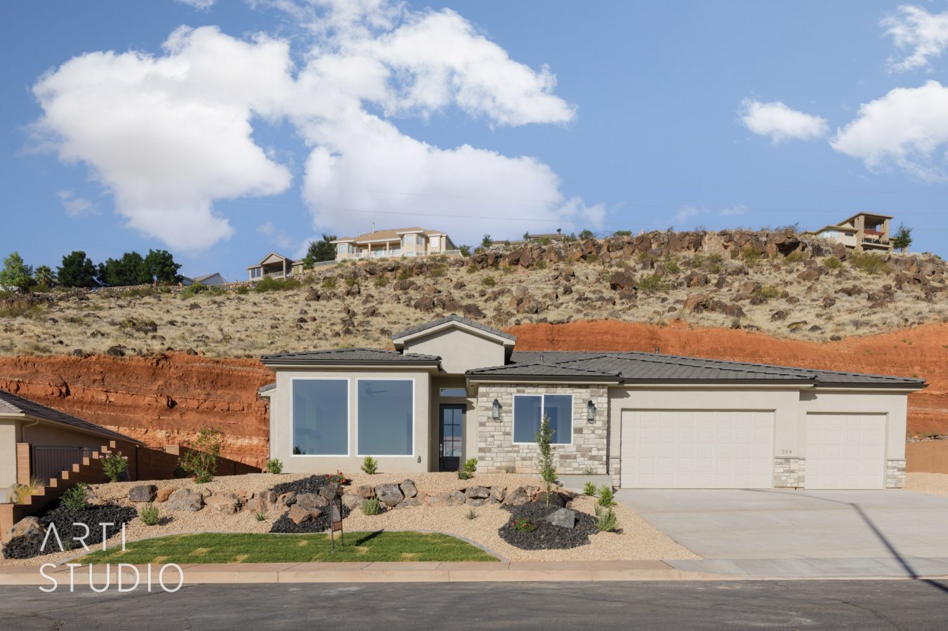 51031 Stunning new home with amazing views. This home built by Teeple's Custom Homes offers a spacious layout with high-end finishes throughout. Tile floors, custom fireplace, quartz countertops, custom cabinets, luxury master suite, fully landscaped. Views of the city, mountains, and new Red Cliffs Temple provide extra relaxing mornings & evenings. This home is ready to go, come see it today!
