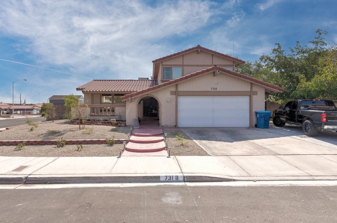 51382 Wonderfully upgraded and maintained home on a large corner lot. Covered patio with sparkling, heated pool, tuff shed, and plenty of room for entertaining. There is even space for RV parking! Tri-level interior with modern upgrades. You must see the beautiful kitchen and vaulted ceilings. Wood burning fireplace, sunken living room, and quaint courtyard give this beauty a very homey feel. Close freeway access and a short drive to the strip, shopping, and pro-sports arenas.