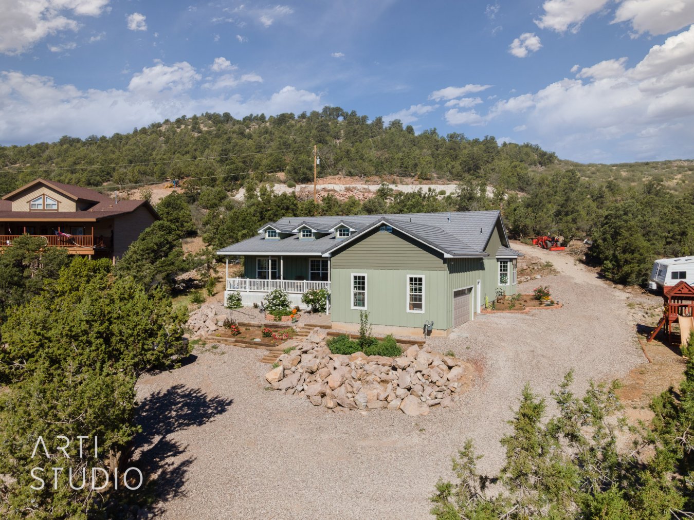 51490 Get out of the heat and enjoy 12-15 degree cooler temps in this beautiful, practically new, home on a large .78 acre lot in Central backing up to open space. Outside you'll find a 40 ft. front porch to enjoy amazing views & RV parking. Inside don't miss the large rooms, double walk in closets in the master, tons of storage & custom cabinetry throughout this builder's home.