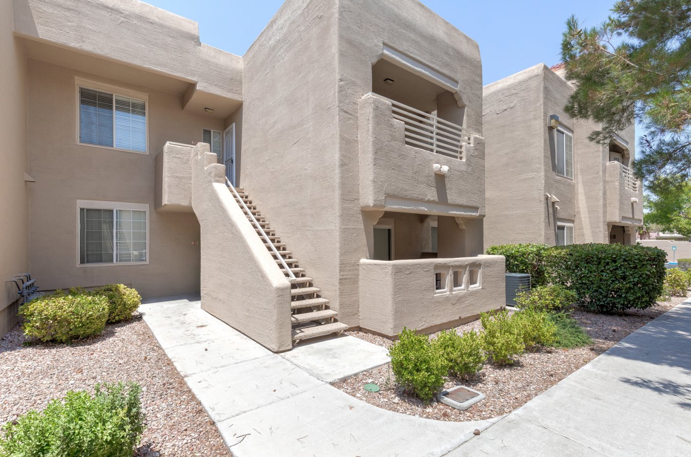 Great location for this cute one bedroom, one bath unit. Upgraded carpeting and pad give this place a new vibe along with fresh paint throughout. Nice sized kitchen overlooks the dining area and great room with plenty of counter space. All appliances stay including refrigerator, washer & dryer There is a great balcony with plenty of storage as well. Ceiling fans in dining room & bedroom. The bedroom has a huge walk in closet which is an awesome feature. This property is located near the pool and clubhouse and has one assigned covered parking space. It is at the gateway to Summerlin near shopping centers with grocery stores, other shops, fantastic restaurants, golf, freeway access, Desert Shores, bike and trail system, and bus routes.